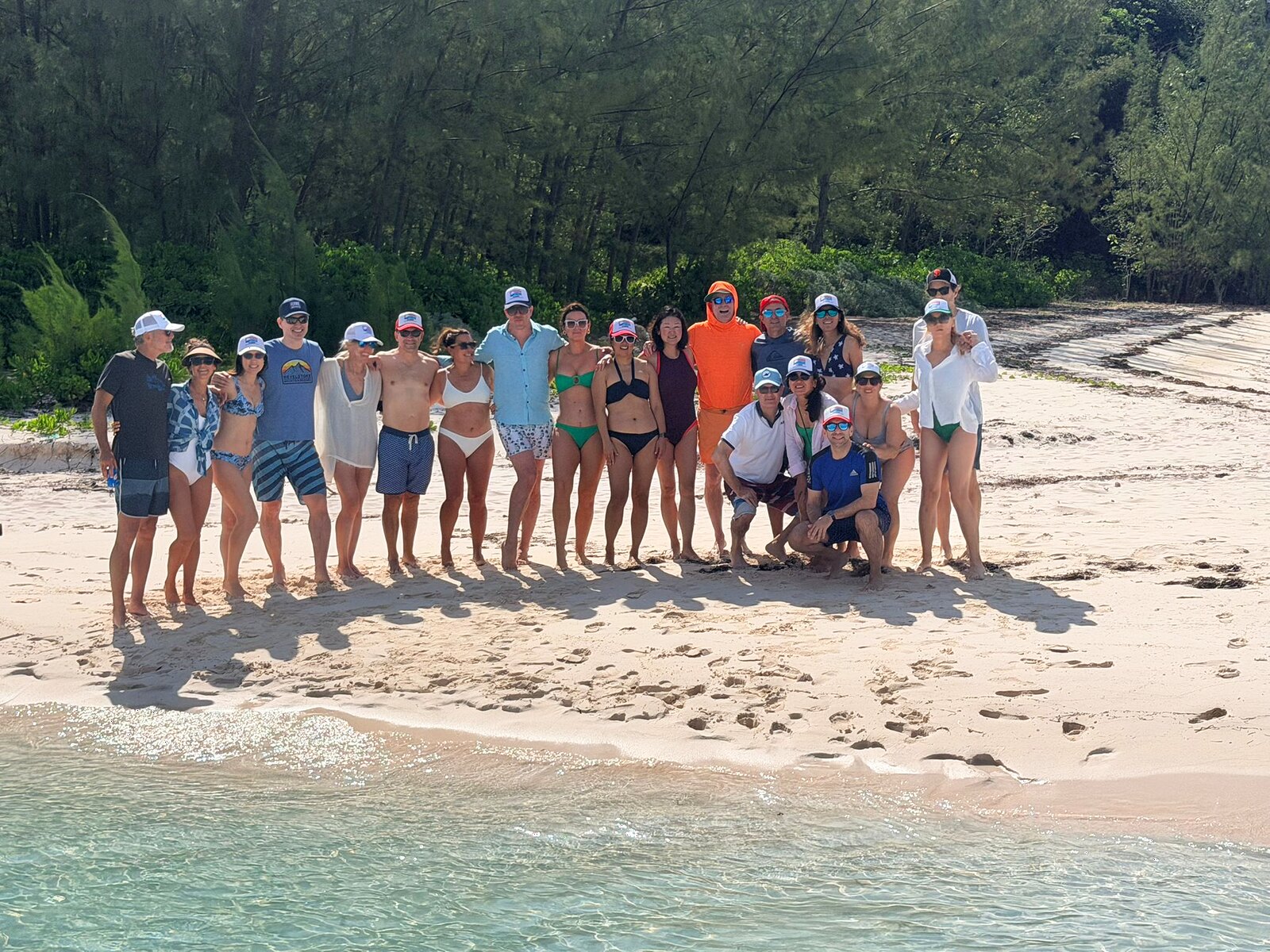 A group enjoying a shallow sandbar on a boat trip from Spanish Wells.